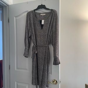 Floral print knee length dress with long sleeves and tie